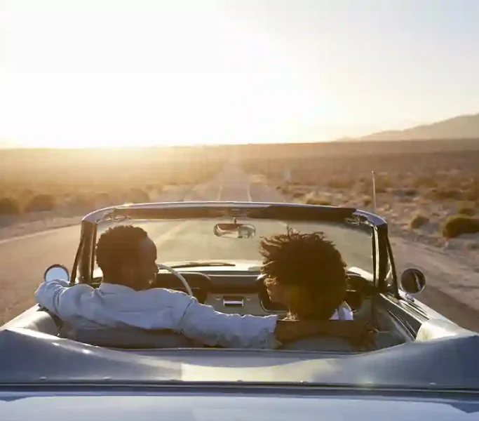 rear-view-of-couple-on-road-trip-driving-classic-c-2024-10-21-20-24-44-utc_5_11zon