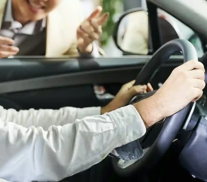 young-man-driving-a-new-car-2023-11-27-04-58-26-utc_8_11zon